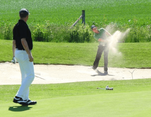 Two Men Golfing