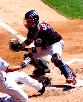 Brian Schneider blocking the plate in 2008